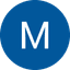 White letter M inside a blue circular icon
